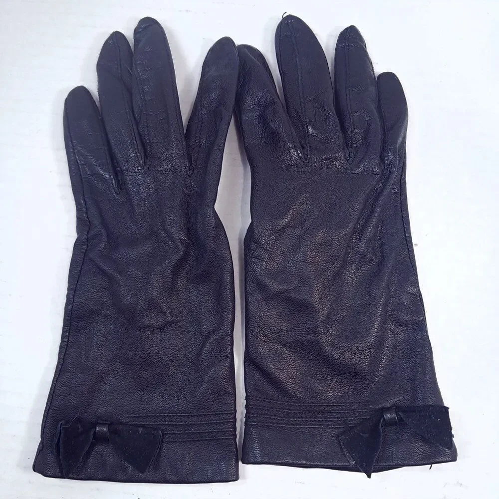 Fownes Leather Gloves women's sz 7 black bow Antron lining Made in Philippines‎